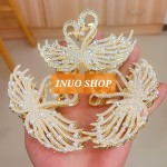 Pinza con diseño de cisne elegante